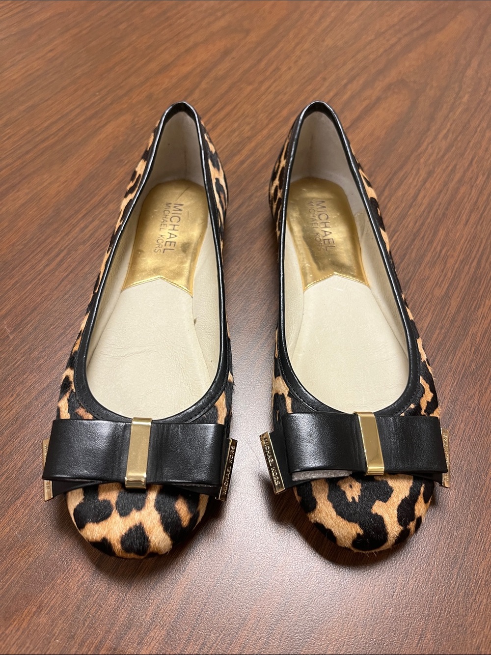 MICHAEL Michael Kors Leopard Print Flats with Black Bow & Gold Accent, size 7